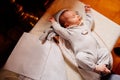 A baby fell asleep on a dressing table in a Church. the ordinance of baptism. Royalty Free Stock Photo