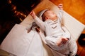 A baby fell asleep on a dressing table in a Church. the ordinance of baptism.