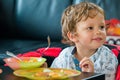 Baby food, babies eating. Kid boy eating healthy food. Royalty Free Stock Photo