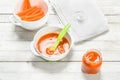 Baby food. Baby puree from fresh carrots with a spoon. Royalty Free Stock Photo