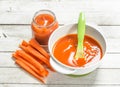 Baby food. Baby puree from fresh carrots with a spoon. Royalty Free Stock Photo