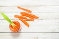 Baby food. Baby puree from fresh carrots with a spoon. Royalty Free Stock Photo