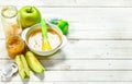 Baby food. Baby puree from fresh green apples. Royalty Free Stock Photo