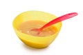 Baby food in plastic bowl