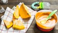 Baby food. Baby puree from fresh pumpkin. Royalty Free Stock Photo