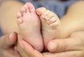 Baby foot in mother hands Royalty Free Stock Photo