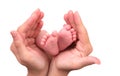 Baby foot in mother hands on white background Royalty Free Stock Photo