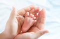 Baby foot in mother hands Royalty Free Stock Photo