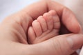 baby foot in mother`s hand Royalty Free Stock Photo