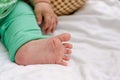 Baby foot on white blanket. Copy space Royalty Free Stock Photo