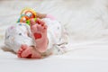 Baby foots with hearts on their feet. A newborn baby is lying on Royalty Free Stock Photo