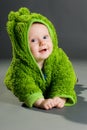 Baby in a frog outfit