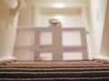 Baby gate view from basement with carpet stairs