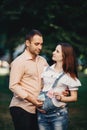 Baby gender. Mom and dad with BOY and GIRL cards Royalty Free Stock Photo