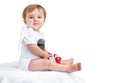 Baby with gift box on white background Royalty Free Stock Photo