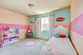 Baby girl bedroom with white bed. Royalty Free Stock Photo