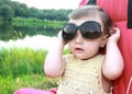 Baby girl in big sunglasses Royalty Free Stock Photo