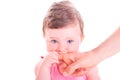 Baby girl biting daddy's hand. Royalty Free Stock Photo