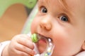 Baby girl biting toy Royalty Free Stock Photo