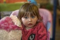 Baby girl with blond hair sitting on swing Royalty Free Stock Photo