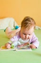 Baby girl with book Royalty Free Stock Photo