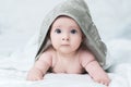 Baby girl or boy after shower with towel on head Royalty Free Stock Photo