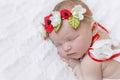 Baby girl in bright colorful hairband