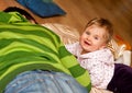 Baby girl and brother on floor Royalty Free Stock Photo