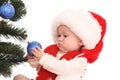 Baby girl and Christmas tree