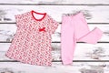 Baby-girl cotton top and trousers.