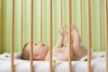 Baby girl in a crib Royalty Free Stock Photo