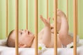 Baby girl in a crib Royalty Free Stock Photo