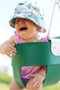 Baby Girl Crying in Toddler Swing