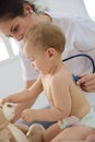 Baby girl at doctor's getting a check-up Royalty Free Stock Photo