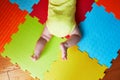 Baby girl lying on play mat Royalty Free Stock Photo