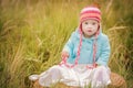 Baby girl with Down syndrome looks surprised Royalty Free Stock Photo