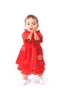 Baby girl in dress catching soap bubbles Royalty Free Stock Photo