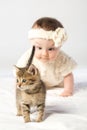 Baby girl dressed in white fur with little Royalty Free Stock Photo