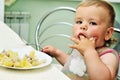 Baby girl eating Royalty Free Stock Photo