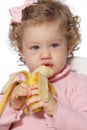 Baby girl eating fruit Royalty Free Stock Photo