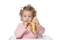 Baby girl eating fruit Royalty Free Stock Photo