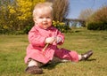 Baby girl garden flowers Royalty Free Stock Photo