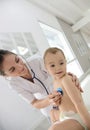 Baby girl getting checked up at doctor's Royalty Free Stock Photo
