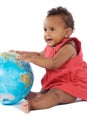 Baby girl with a globe of the world Royalty Free Stock Photo