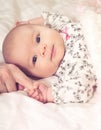 Baby girl grasping her parents finger Royalty Free Stock Photo