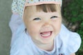 Baby girl happy smiling portrait. Domestic lifestyle in family. Emotionally laughing kid