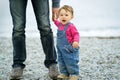 Baby girl and her father on sea beach Royalty Free Stock Photo