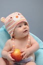 Baby girl hold the apple Royalty Free Stock Photo