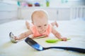 Baby girl with kitchen utensils Royalty Free Stock Photo