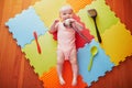 Baby girl with kitchen utensils Royalty Free Stock Photo